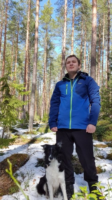 Krister having a walk with his dog in the forest